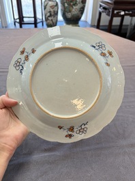 A pair of Chinese famille rose 'tobacco leaf' plates and a saucer, Qianlong