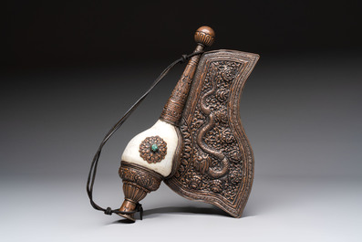 Two Tibetan brass and silver-mounted conch shell trumpets or 'Dung dkar', 19th C.