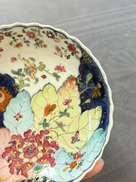 A pair of Chinese famille rose 'tobacco leaf' plates and a saucer, Qianlong