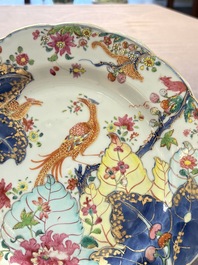 A pair of Chinese famille rose 'tobacco leaf' plates and a saucer, Qianlong