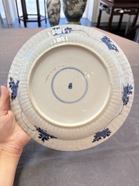 Six Chinese blue and white 'peony scroll' plates, Kangxi