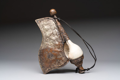 Two Tibetan brass and silver-mounted conch shell trumpets or 'Dung dkar', 19th C.