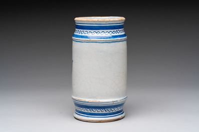 A rare blue and white Dutch maiolica albarello with a cherub head and a mascaron, 1st quarter 17th C.