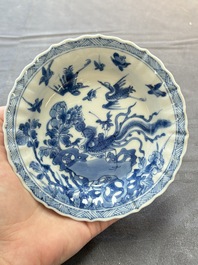 Eight Chinese blue, white and iron-red cups and twelve saucers, Kangxi/Yongzheng