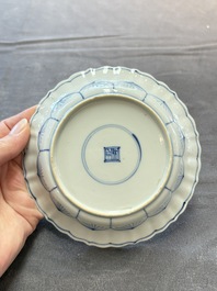 Eight Chinese blue, white and iron-red cups and twelve saucers, Kangxi/Yongzheng