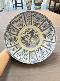 A Chinese blue and white 'kraak' bowl with ducks and flowers, Wanli