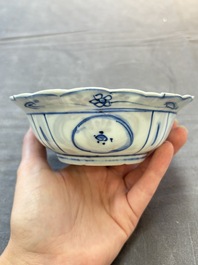 Five Chinese blue and white 'klapmuts' bowls with figural design, Wanli