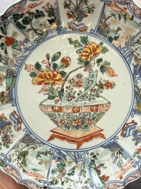 Three Chinese famille rose plates and a famille verte lobed plate, Kangxi/Qianlong