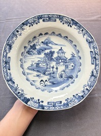 Six Chinese blue and white plates and a dish with landscape design, 18th C.