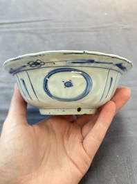 Five Chinese blue and white 'klapmuts' bowls with figural design, Wanli