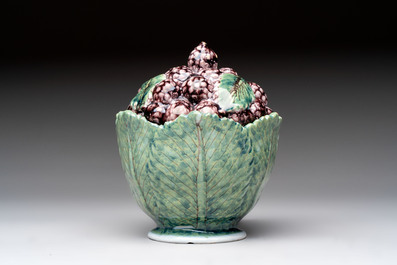 A polychrome Dutch Delft 'mulberries' tureen and cover on stand, 18th C.