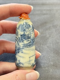 Two Chinese blue, white and copper-red snuff bottles and two blue and white snuff bottles, 19th C.