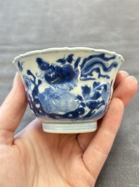 Eight Chinese blue, white and iron-red cups and twelve saucers, Kangxi/Yongzheng