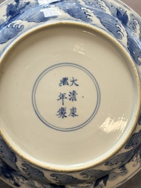A pair of Chinese blue and white 'dragon' plates, Kangxi mark and of the period