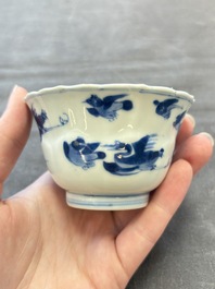 Eight Chinese blue, white and iron-red cups and twelve saucers, Kangxi/Yongzheng
