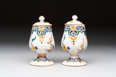 A pair of polychrome Dutch Delft mustard jars and covers, 18th C.