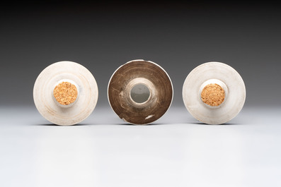 Three Chinese famille rose 'mandarin subject' vases and covers, Qianlong