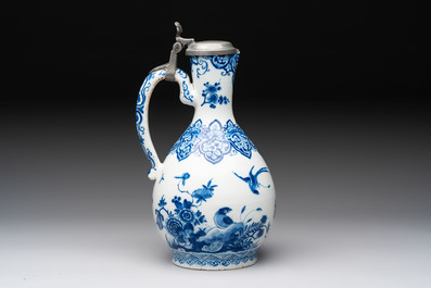 A fine blue and white Dutch Delft jug with pewter cover, early 18th C.