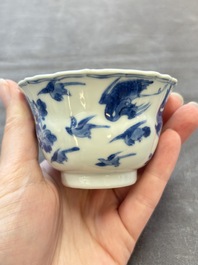 Eight Chinese blue, white and iron-red cups and twelve saucers, Kangxi/Yongzheng
