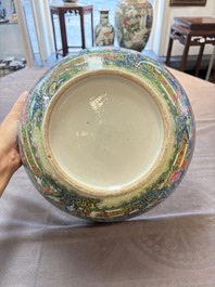 A Chinese Canton famille rose 'peacock' punch bowl, 19th C.