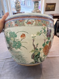 A Chinese famille rose 'mandarin ducks in a lotus pond' scroll pot, 19th C.