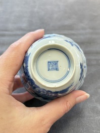 Eight Chinese blue, white and iron-red cups and twelve saucers, Kangxi/Yongzheng