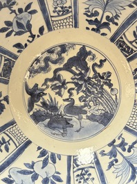 A Chinese blue and white 'kraak' bowl with ducks and flowers, Wanli