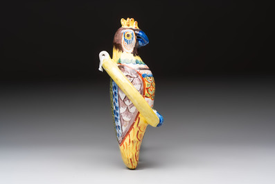 A white Dutch Delft cow milker group and a polychrome Dutch Delft parrot, 18/19th C.