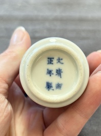 Two Chinese blue, white and copper-red snuff bottles and two blue and white snuff bottles, 19th C.