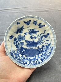 Eight Chinese blue, white and iron-red cups and twelve saucers, Kangxi/Yongzheng