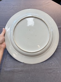 Six Chinese blue and white plates and a dish with landscape design, 18th C.