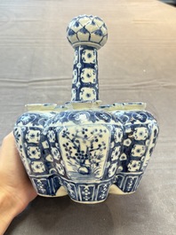 A Chinese blue and white tulip vase with floral design, 19th C.