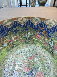 A Chinese Canton famille rose 'peacock' punch bowl, 19th C.