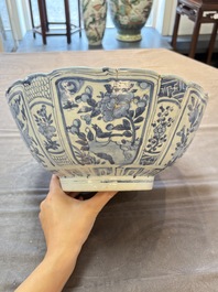 A Chinese blue and white 'kraak' bowl with ducks and flowers, Wanli