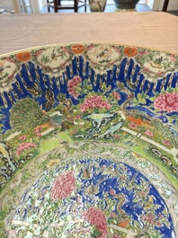 A Chinese Canton famille rose 'peacock' punch bowl, 19th C.