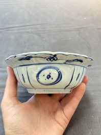 Five Chinese blue and white 'klapmuts' bowls with figural design, Wanli