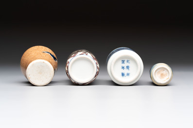 Two Chinese blue, white and copper-red snuff bottles and two blue and white snuff bottles, 19th C.