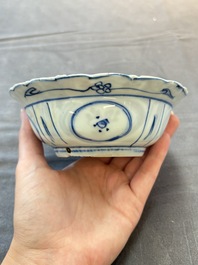 Five Chinese blue and white 'klapmuts' bowls with figural design, Wanli