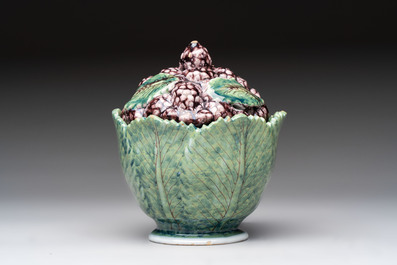 A polychrome Dutch Delft 'mulberries' tureen and cover on stand, 18th C.