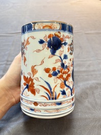 A Chinese blue and white jug and an Imari-style tankard, Transitional period/Kangxi