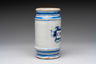 A rare blue and white Dutch maiolica albarello with a cherub head and a mascaron, 1st quarter 17th C.