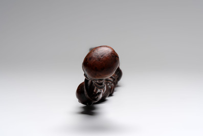 A finely carved boxwood 'vanitas' or 'memento mori' stick, 18/19th C.