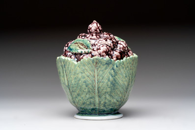 A polychrome Dutch Delft 'mulberries' tureen and cover on stand, 18th C.
