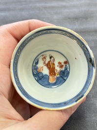 Eight Chinese blue, white and iron-red cups and twelve saucers, Kangxi/Yongzheng
