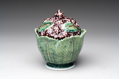 A polychrome Dutch Delft 'mulberries' tureen and cover on stand, 18th C.