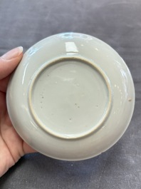 Eight Chinese blue, white and iron-red cups and twelve saucers, Kangxi/Yongzheng