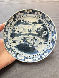 Six Chinese blue and white plates and a dish with landscape design, 18th C.