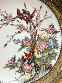A Chinese famille rose gilt-decorated dish with birds among blossoming branches, Yongzheng mark, 20th C.