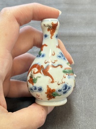 A Chinese wucai and two famille rose miniature vases and four famille rose snuff bottles, Wanli, Qianlong and Shen De Tang 慎德堂 marks, 19/20th C.