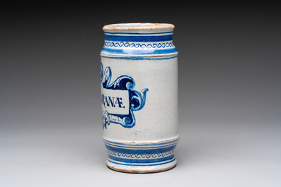 A rare blue and white Dutch maiolica albarello with a cherub head and a mascaron, 1st quarter 17th C.